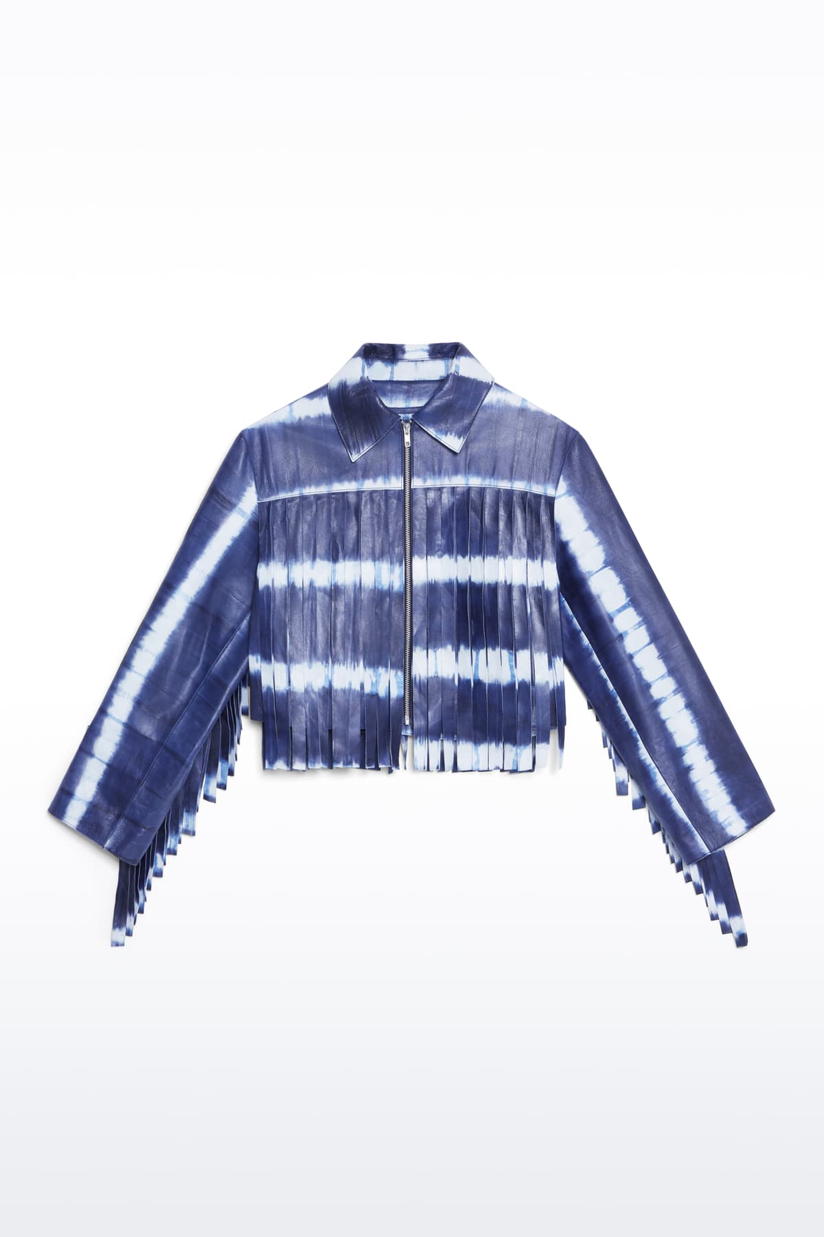 Packshot of the Charlotta Fringe Jacket in Ocean Tie Dye, is designed in leather with a cropped silhouette and raw edge finishes. The color is a dark blue with white tie-dye pattern.