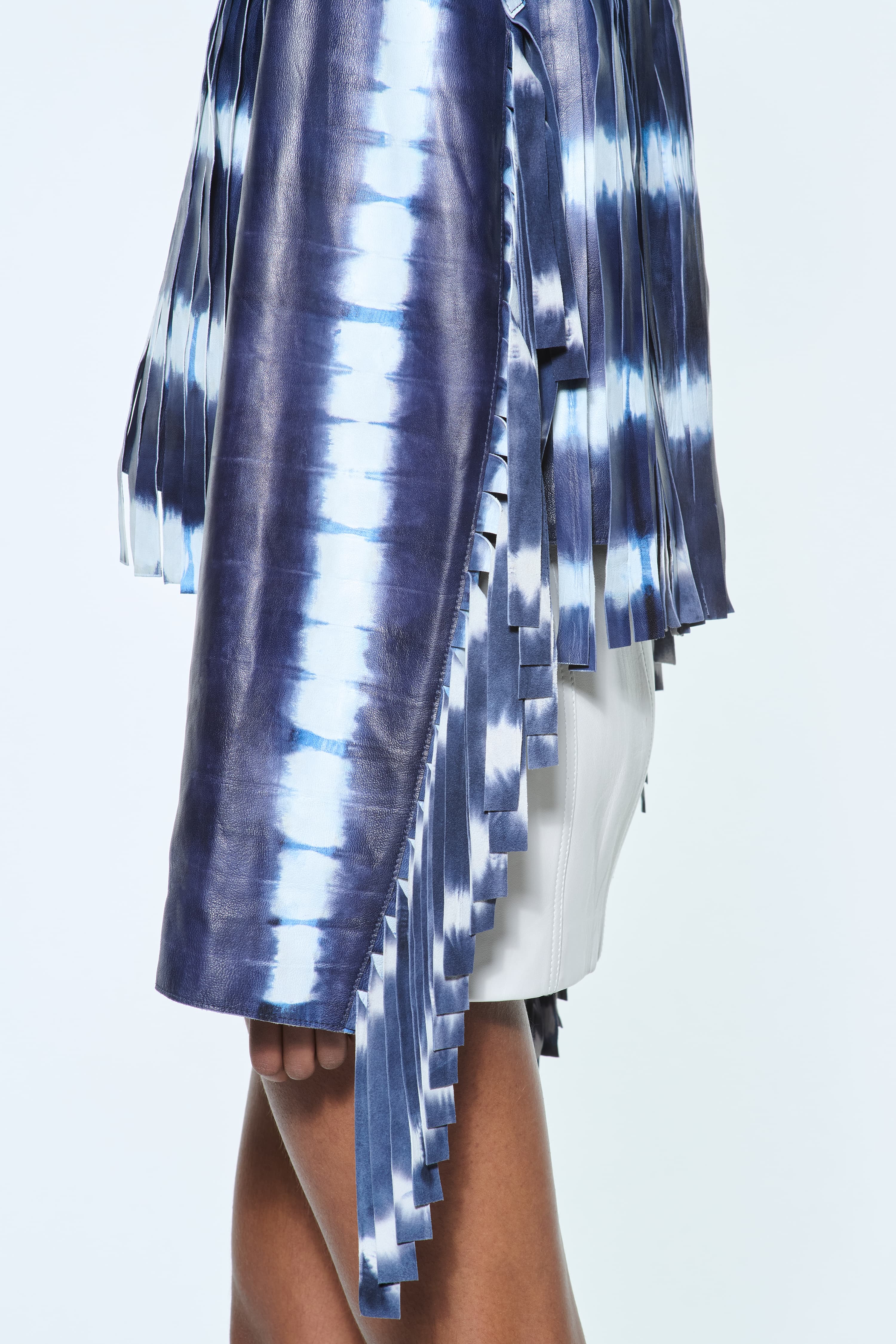 Additional view of the Charlotta Fringe Jacket in Ocean Tie Dye, is designed in leather with a cropped silhouette and raw edge finishes.