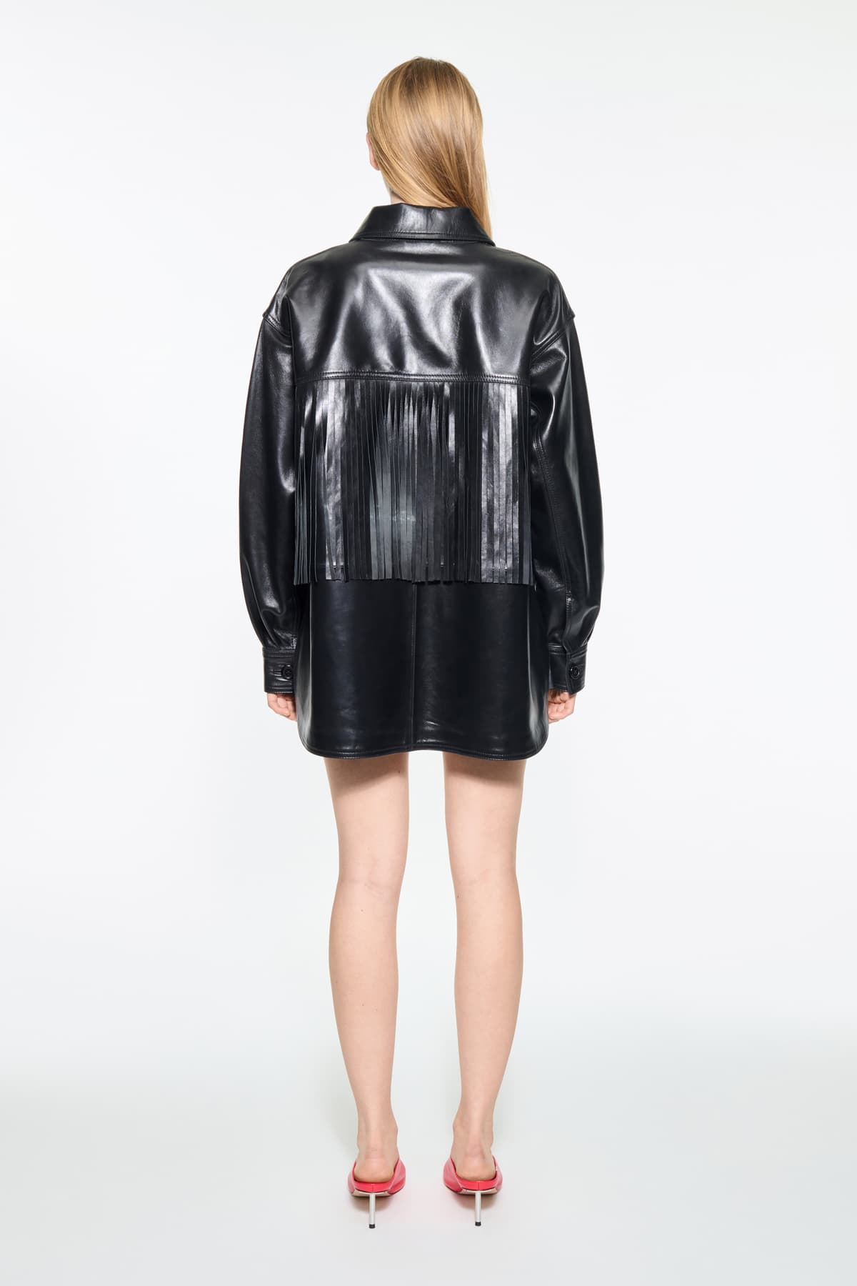 Back view of the Saskia Fringe Shirt in Black, Saskia Shirt is crafted from leather with a soft, flowing silhouette.