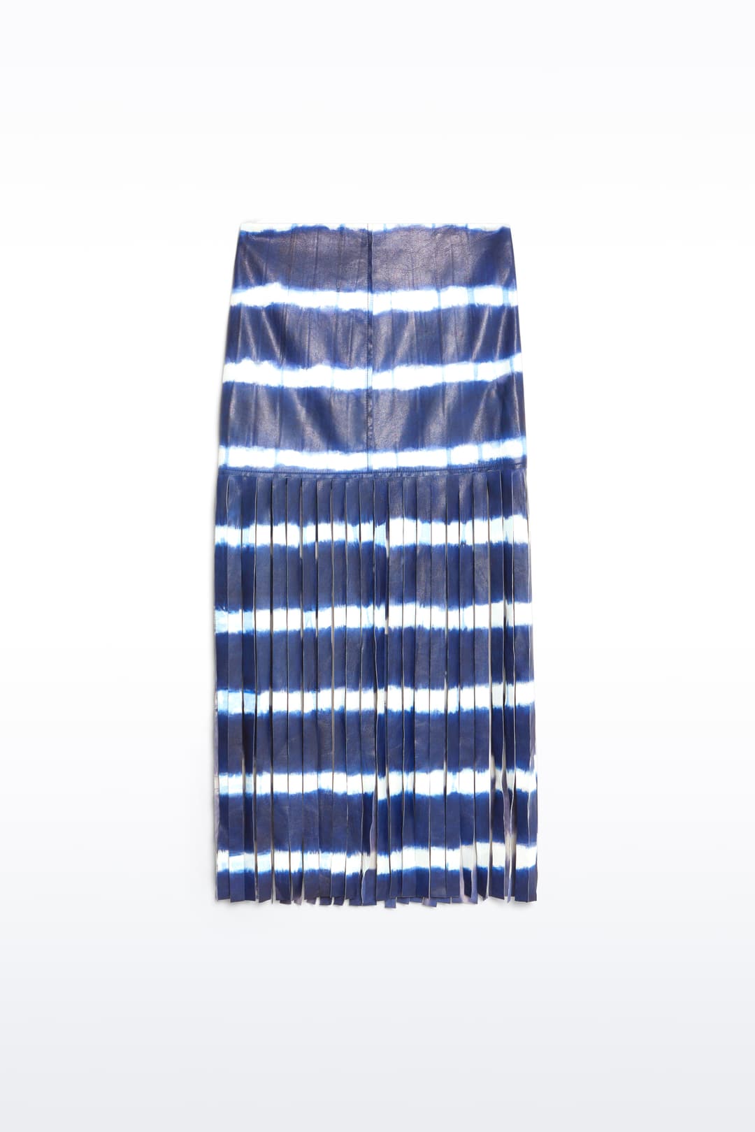Packshot of the Viviana Fringe Skirt in Ocean Tie Dye, is made from leather and features a clean, contemporary silhouette with raw edge fringes. The color is a dark blue with white tie-dye pattern.