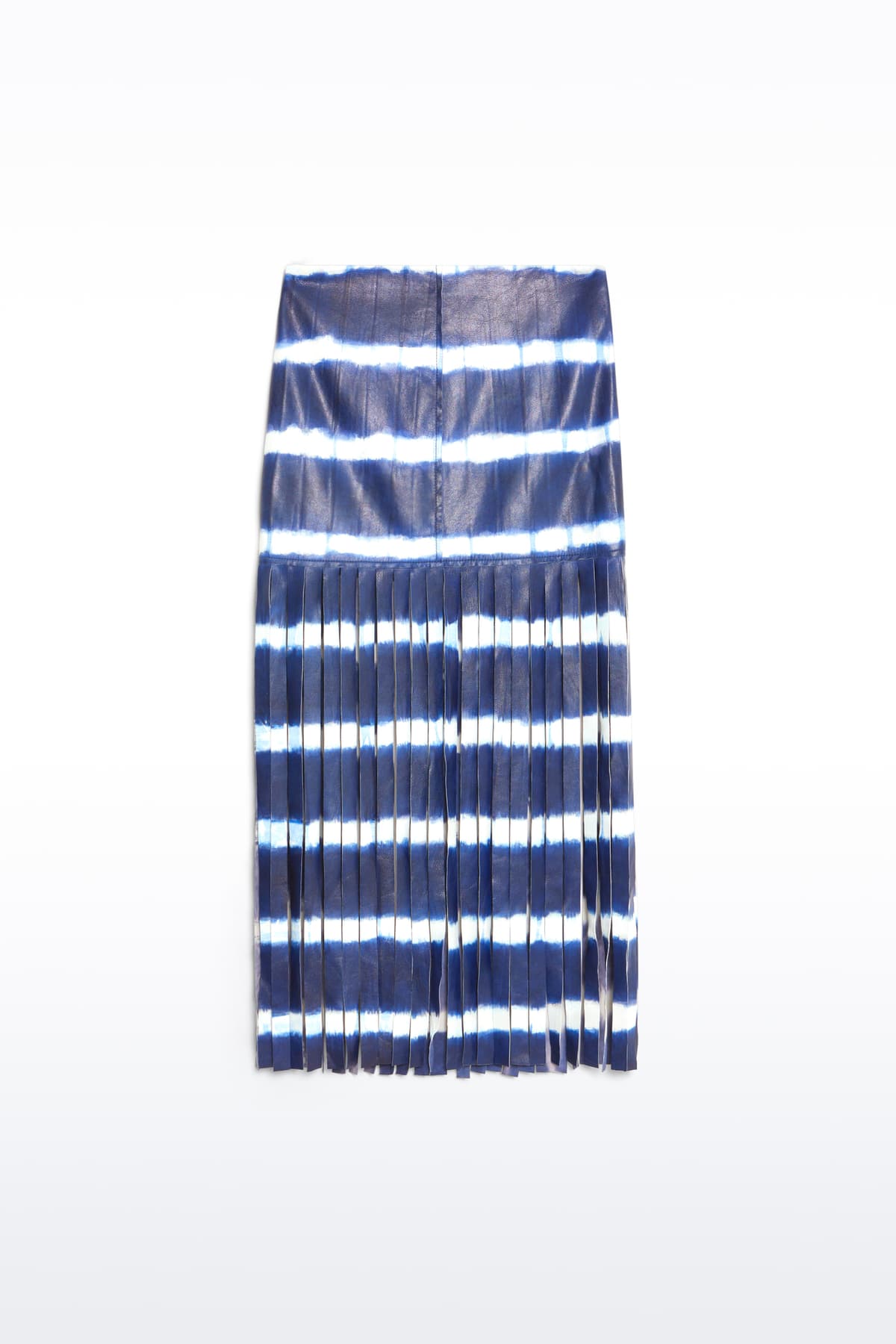 Packshot of the Viviana Fringe Skirt in Ocean Tie Dye, is made from leather and features a clean, contemporary silhouette with raw edge fringes. The color is a dark blue with white tie-dye pattern.