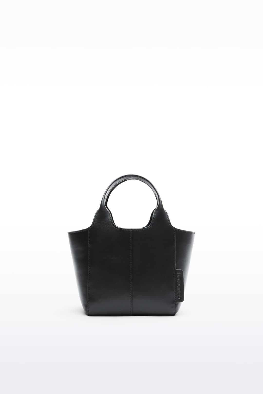 Front view of the Lois Mini Bag in Black, is a smaller bag made in leather.
