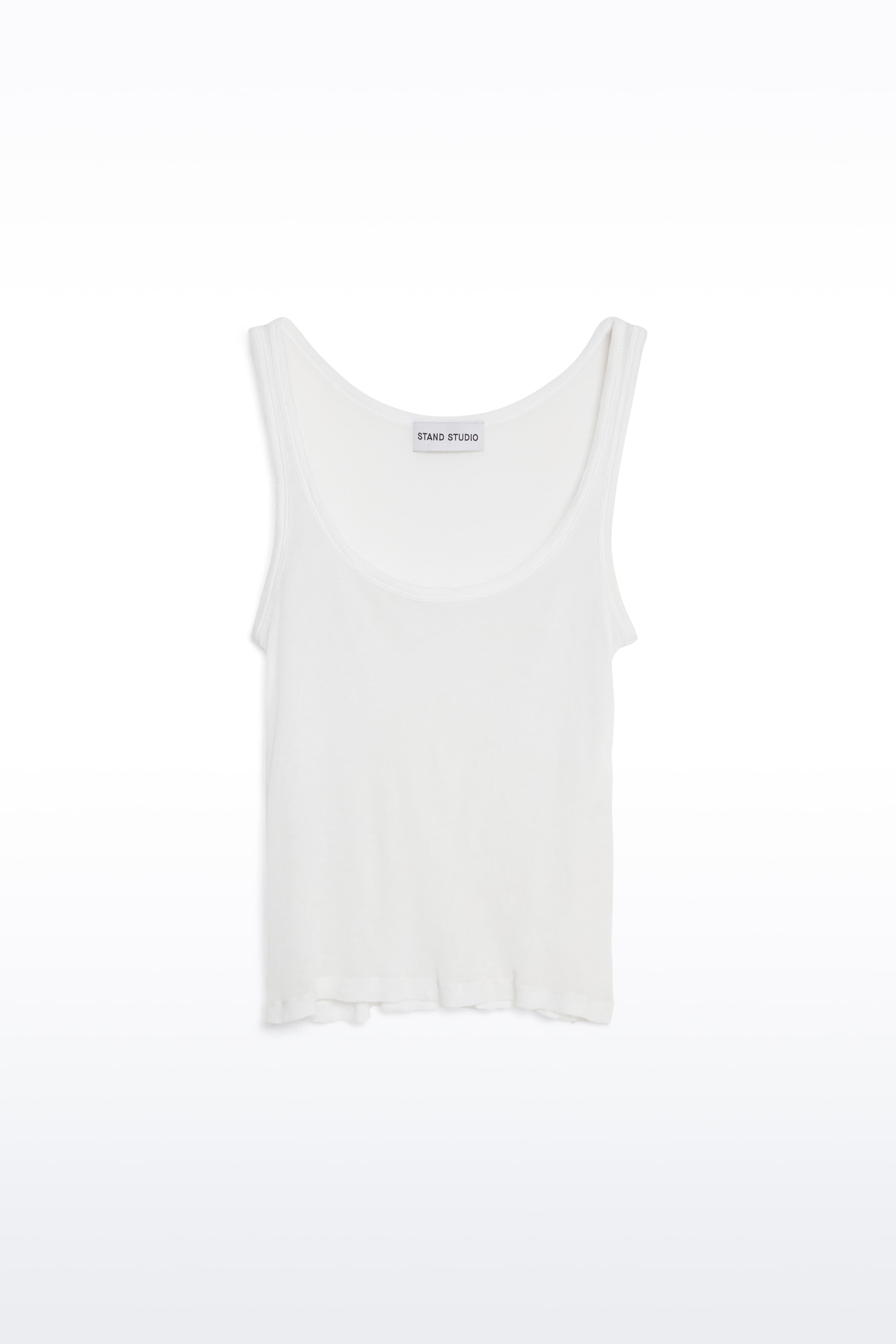 Packshot of the Amoura Top in White, is a tank top crafted from soft ribbed fabric.