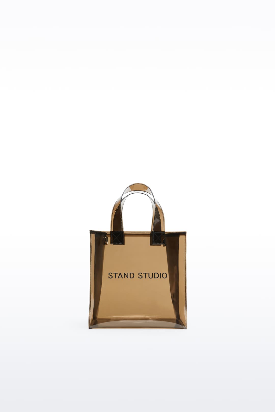 Front view of the Tina Mini Tote in Black, is a compact version of the Tina Tote, crafted from transparent material.