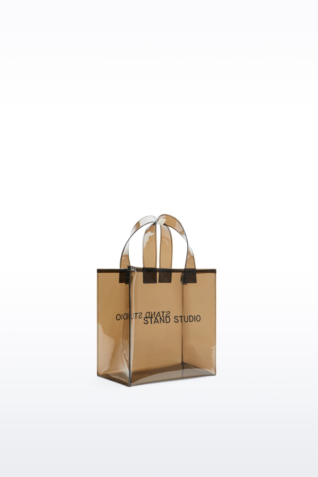 Additional view of the Tina Mini Tote in Black, is a compact version of the Tina Tote, crafted from transparent material.