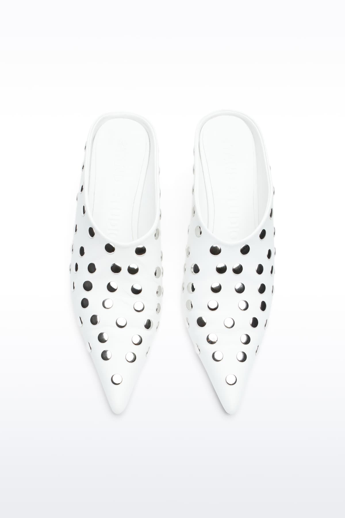 Above view of Kelsey Studded Mule in White, Kelsey Mule is a slip-on mule crafted in smooth nappa leather with sleek metallic studs.