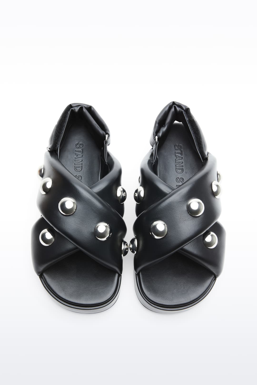 Above view of Sammy Sandal in Black, is a bold sandal with voluminously padded straps and silver ball-stud detailing.