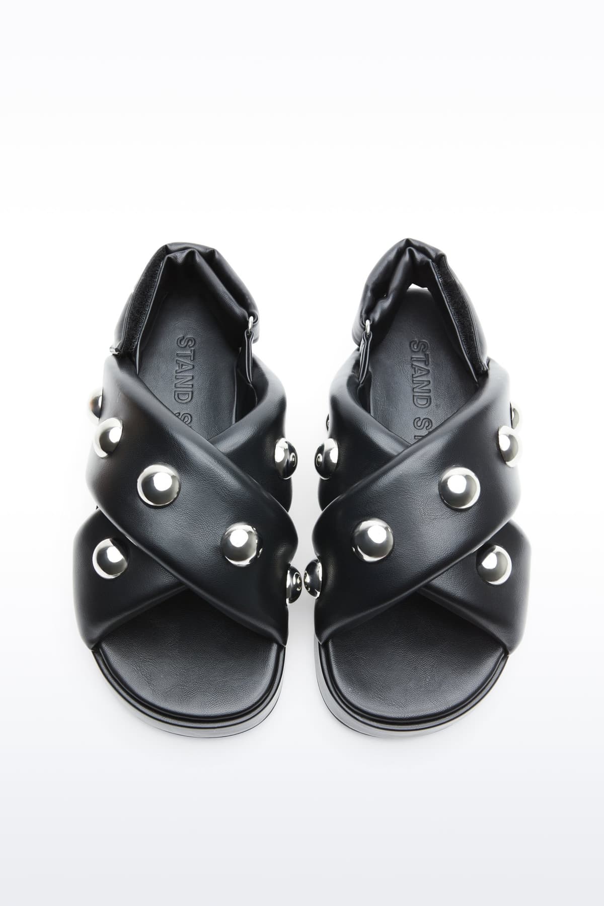 Above view of Sammy Sandal in Black, is a bold sandal with voluminously padded straps and silver ball-stud detailing.