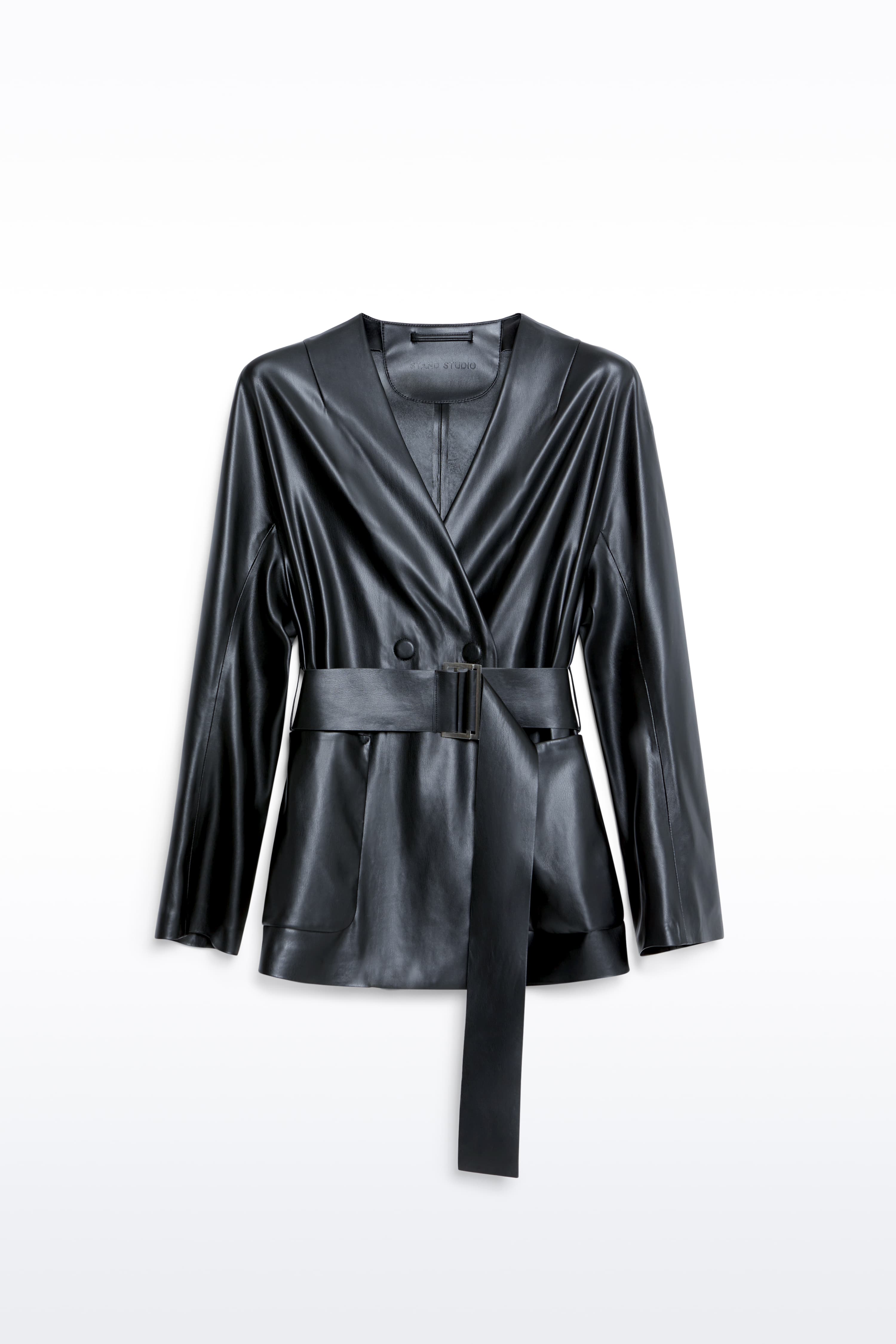 Packshot of the Noria Jacket in Black, is a faux leather jacket with a wrap design and a belted waist.