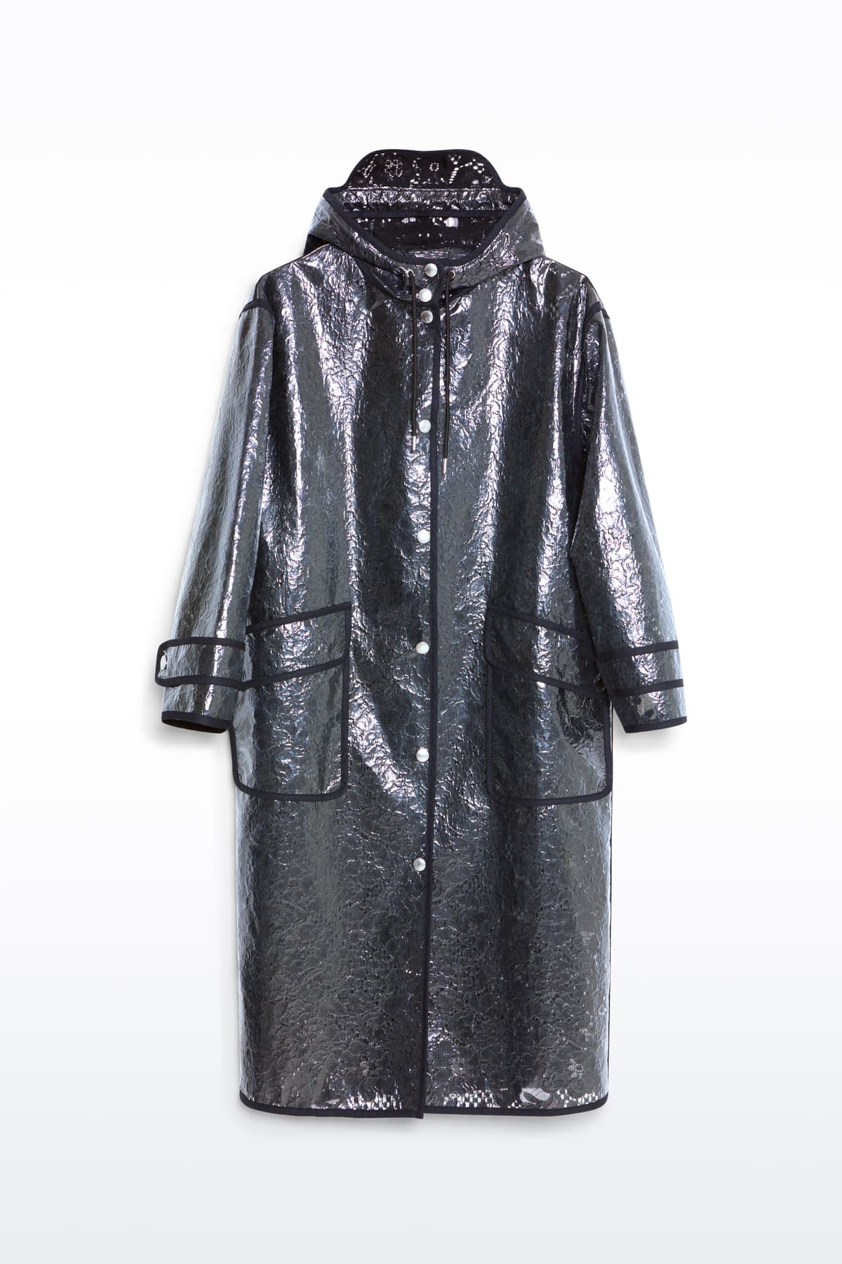 Packshot of the True Raincoat in Black, is a lightweight raincoat with a lace-patterned design.