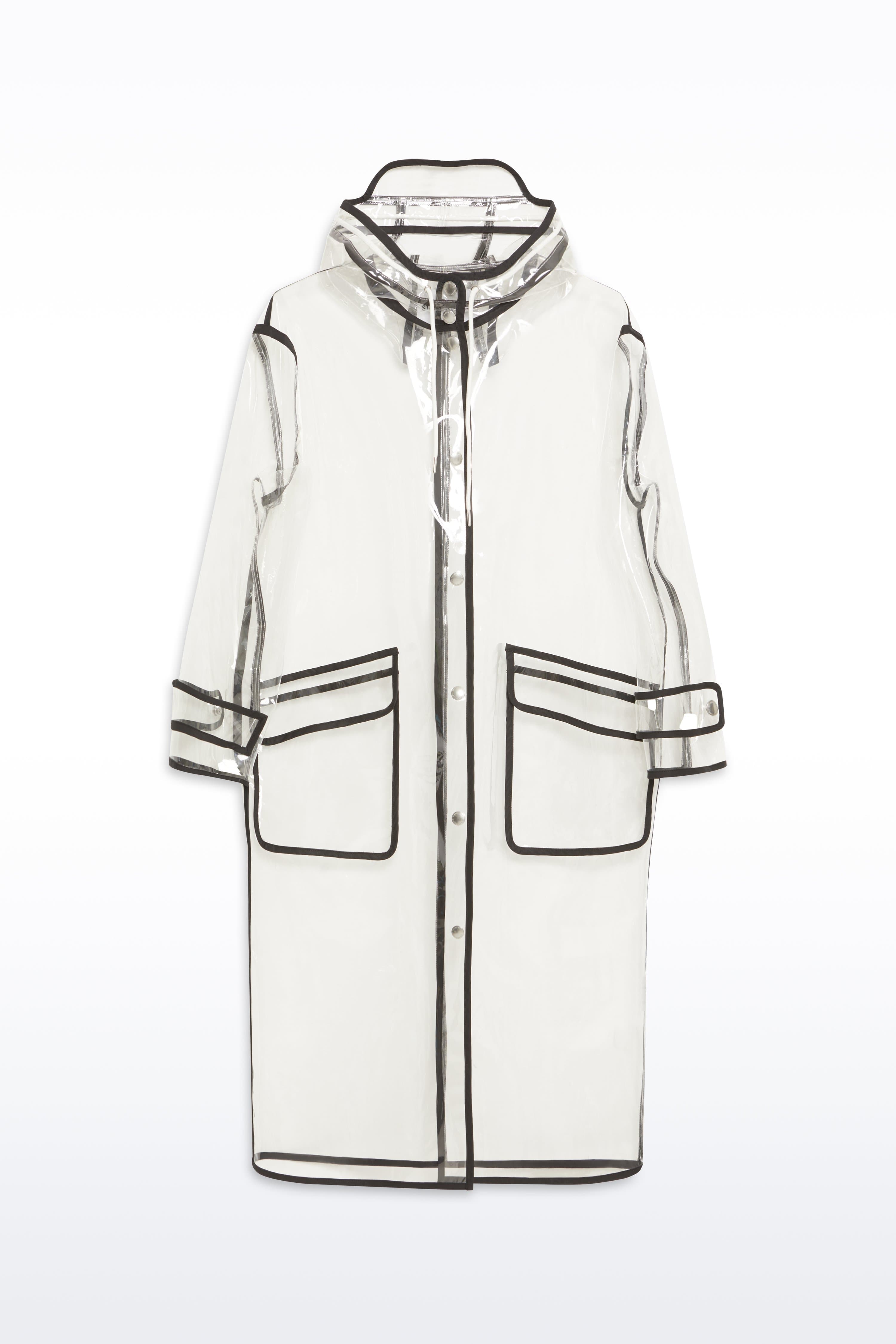 Packshot of the True Raincoat in Transparent, is a lightweight, fully transparent raincoat with contrast binding details.