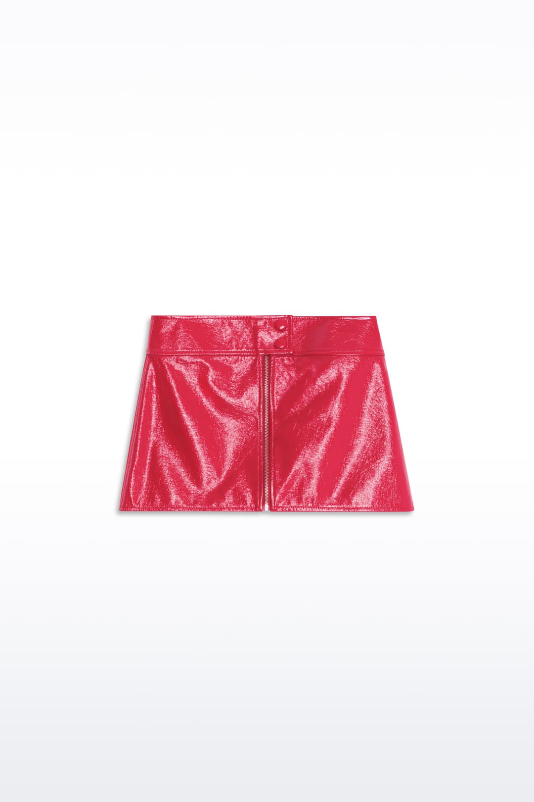 Packshot of the Tara Skirt in Watermelon, is a mini faux leather skirt with a glossy finish. The color is a bold red tone.